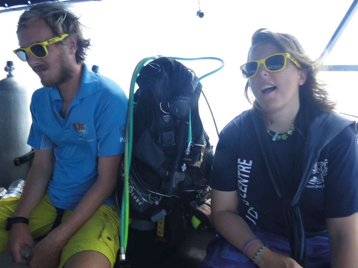 Dive pros working on a boat abroad